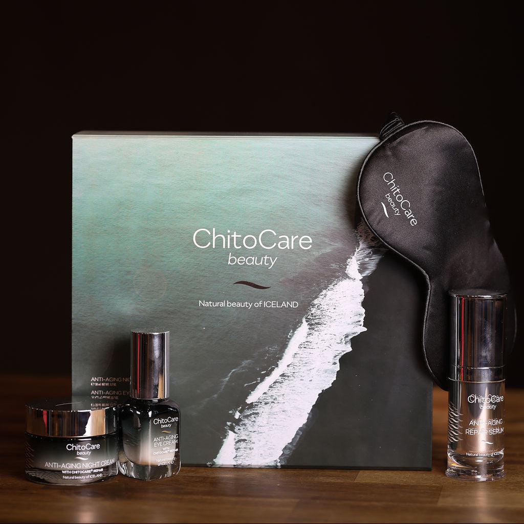 ChitoCare beauty products including eye mask, eye cream, serum and night cream on a dark background