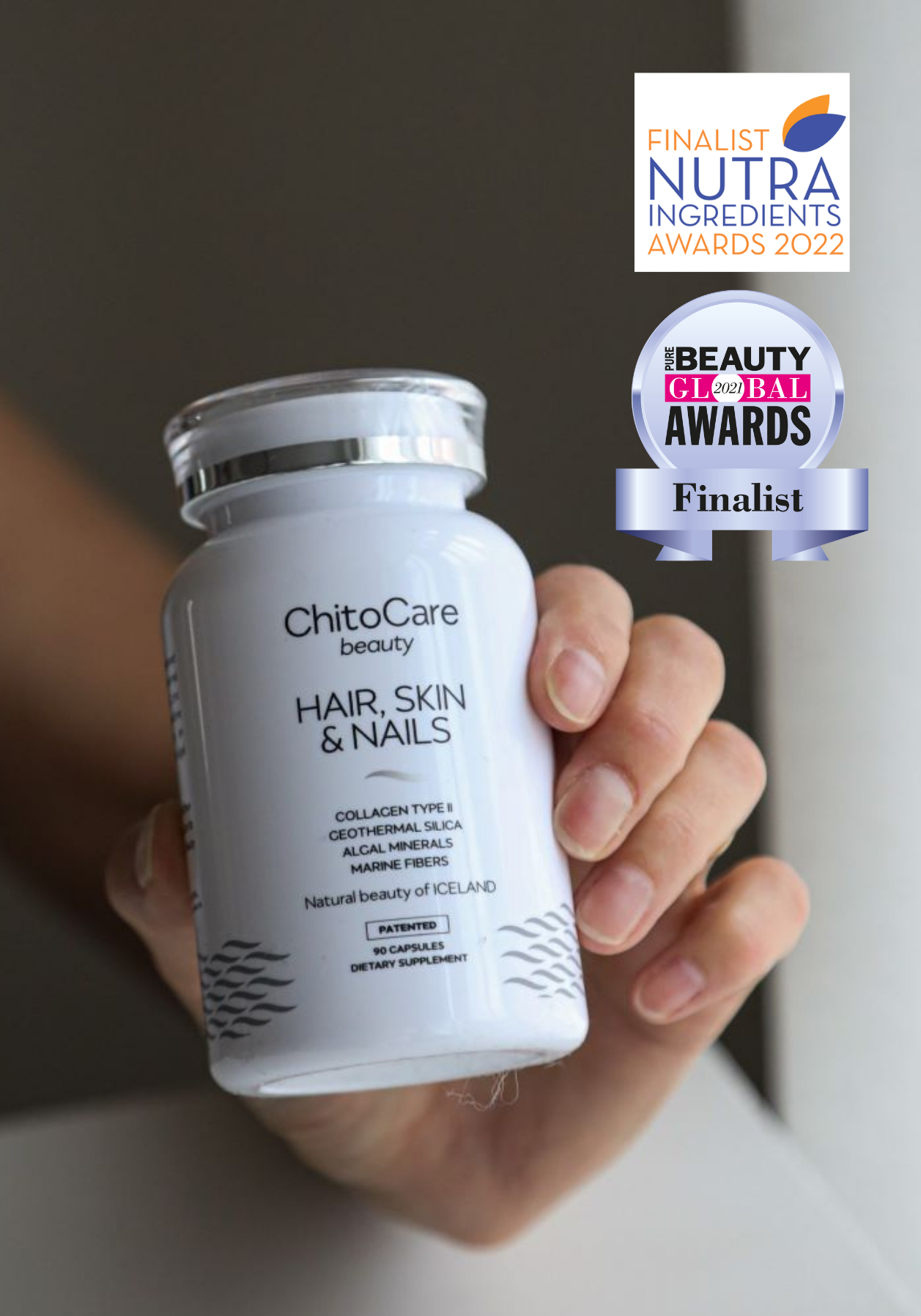 Hand holding a ChitoCare supplement bottle with awards displayed above